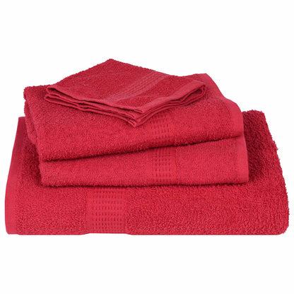 the red towels folded in a pile showing the textured border detail