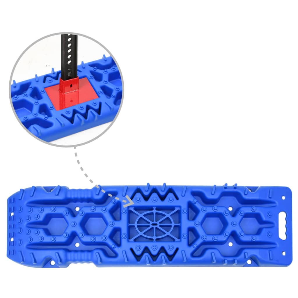 The blue traction boards with a close-up circle showing a jack base in use