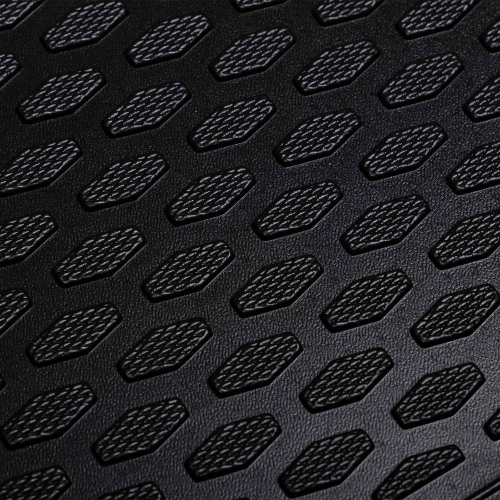 Close-up of the hexagonal textured pattern on the rubber car boot liner
