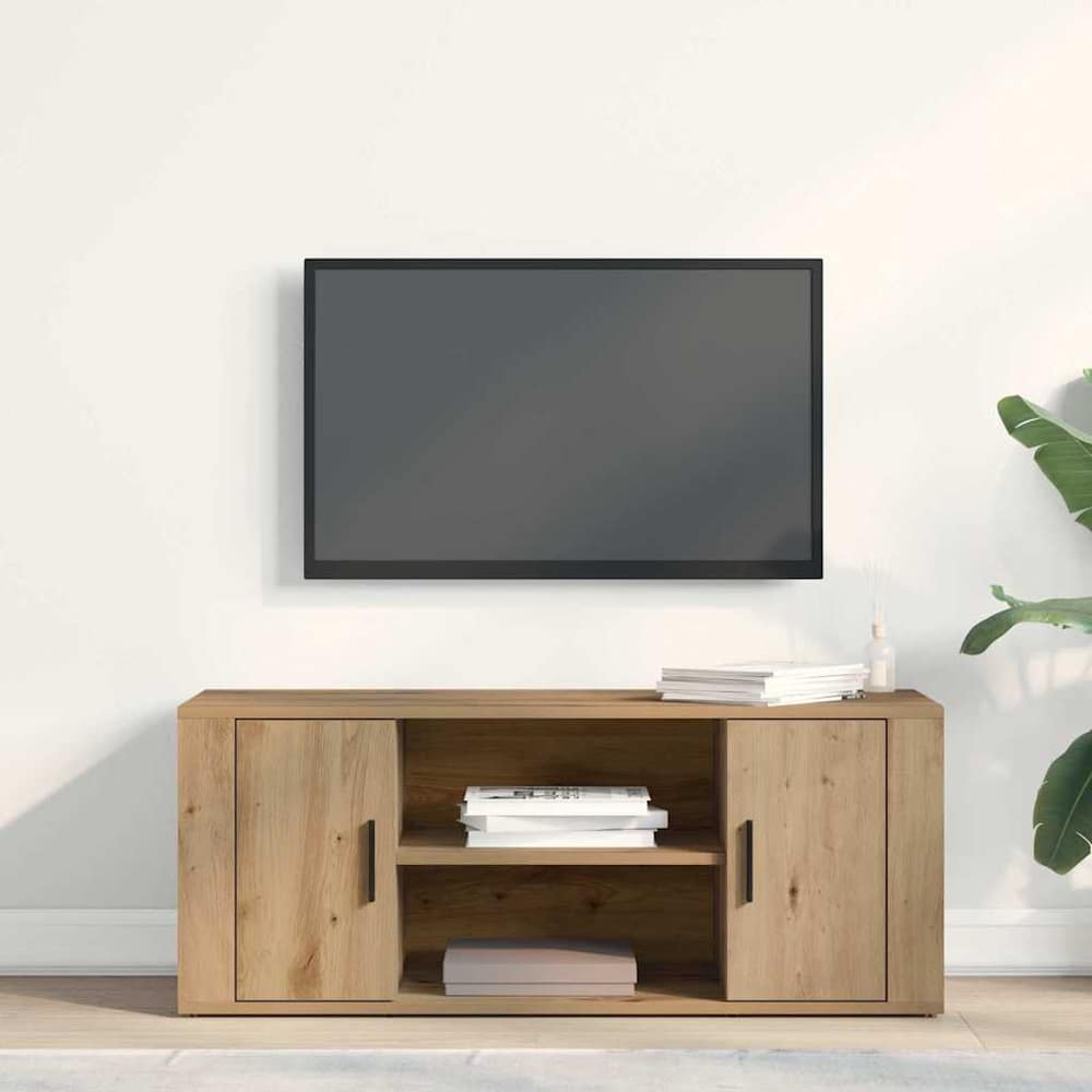 The TV cabinet in a room with a wall-mounted television above it