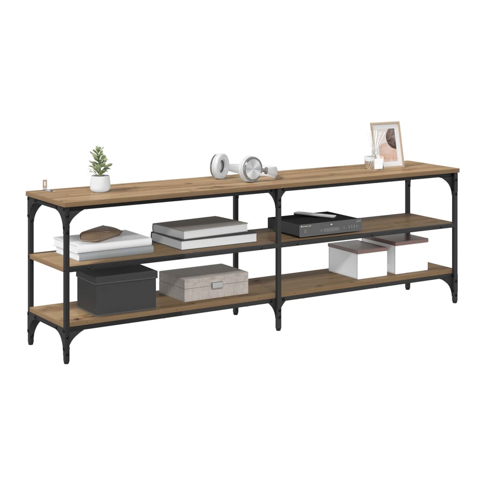 The TV cabinet with a TV and storage boxes on its shelves
