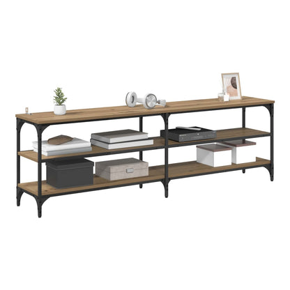 The TV cabinet with a TV and storage boxes on its shelves