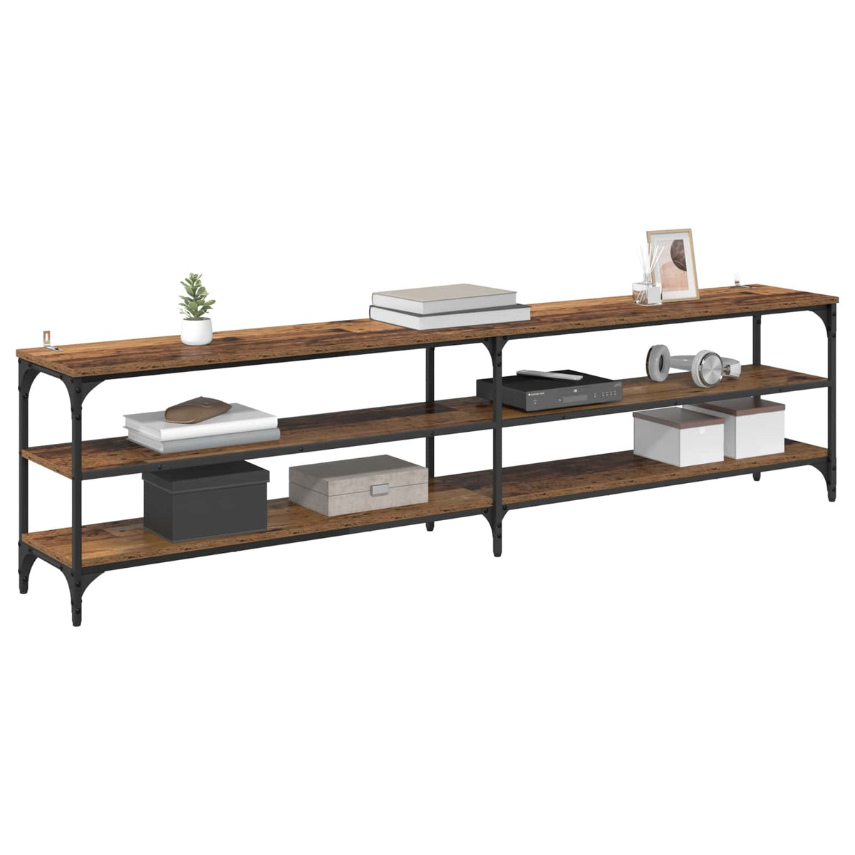 the TV cabinet styled with various decorative items and media equipment on the shelves