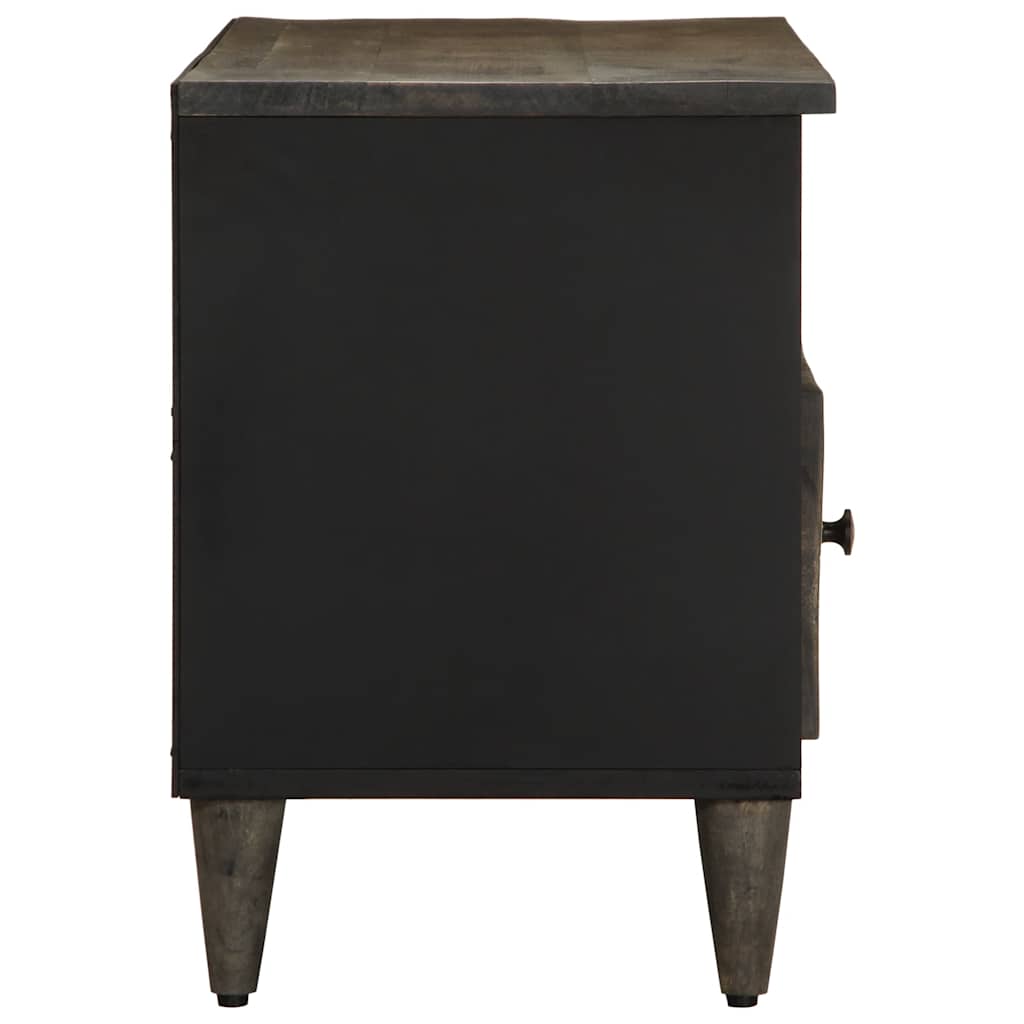 Side view of the black mango wood media console showing its tapered legs