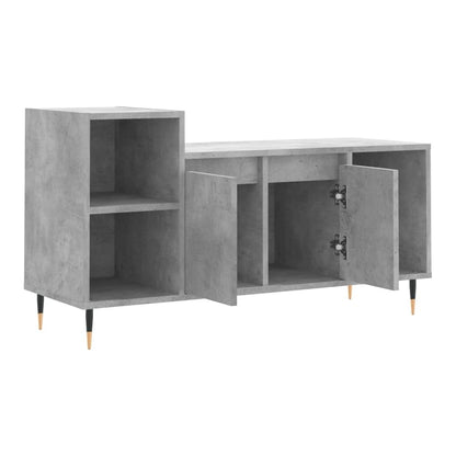 The concrete grey TV cabinet with all doors open showing storage compartments