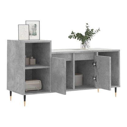 The grey TV cabinet with doors open revealing internal storage space and shelves