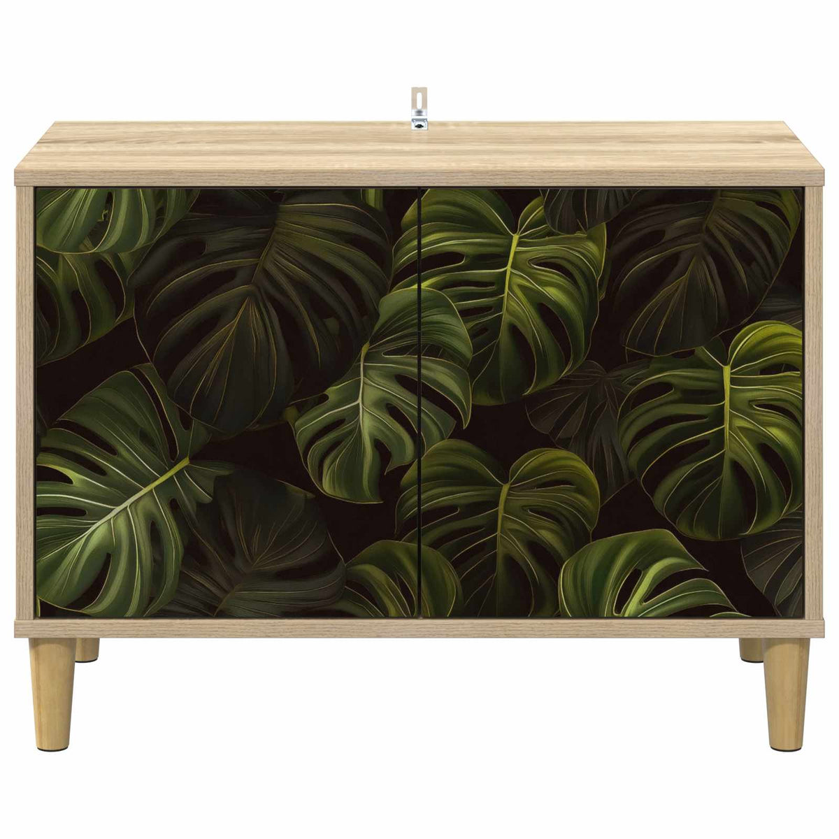The TV cabinet viewed directly from the front showing the leaf patterned doors and wooden legs
