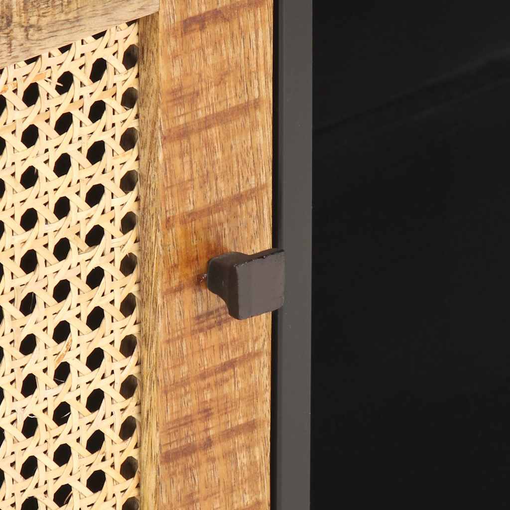 A close-up of the small black handle on the textured wooden cabinet door