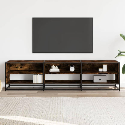 A TV cabinet in a living room setting with a television and decorative items