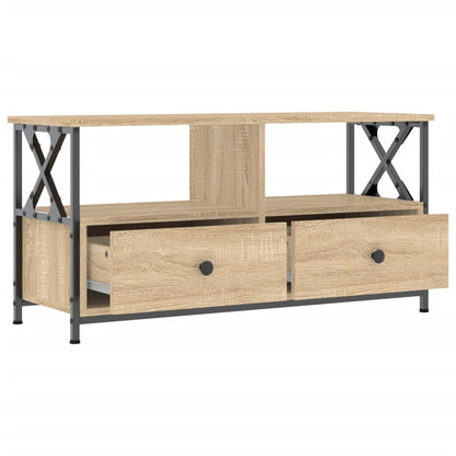 The TV cabinet with one drawer open, revealing storage space inside