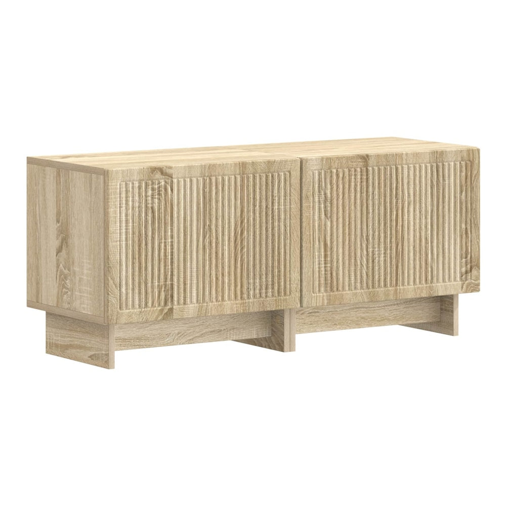The TV stand is made of engineered wood with a sonoma oak finish and ribbed doors