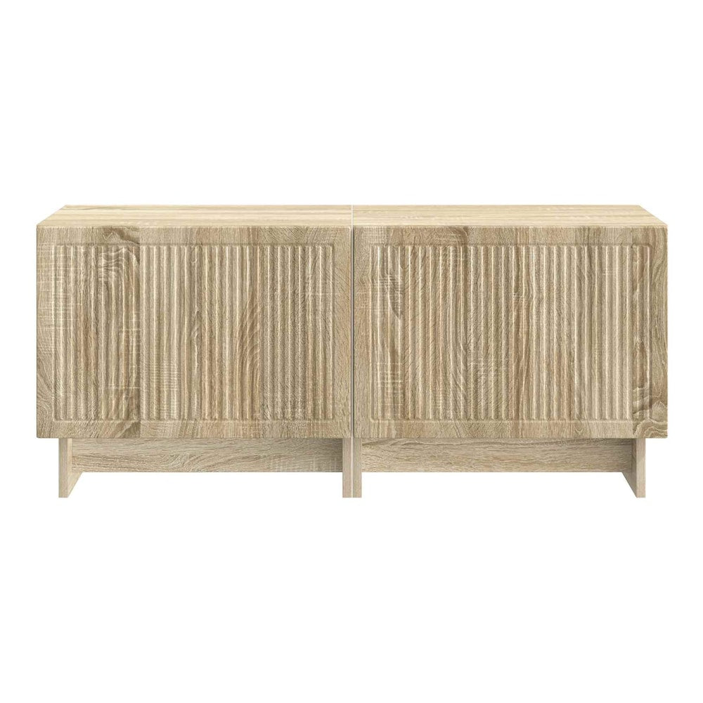 A front view of the TV cabinet with its doors closed, showing the ribbed texture