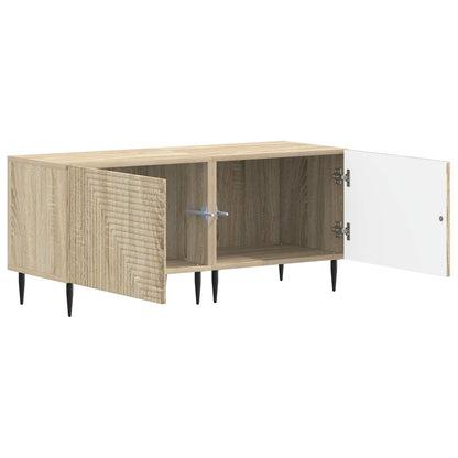 The TV cabinet is open showing two compartments and white doors