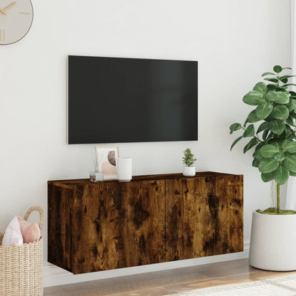 The wall-mounted TV cabinet is shown in a living room setting