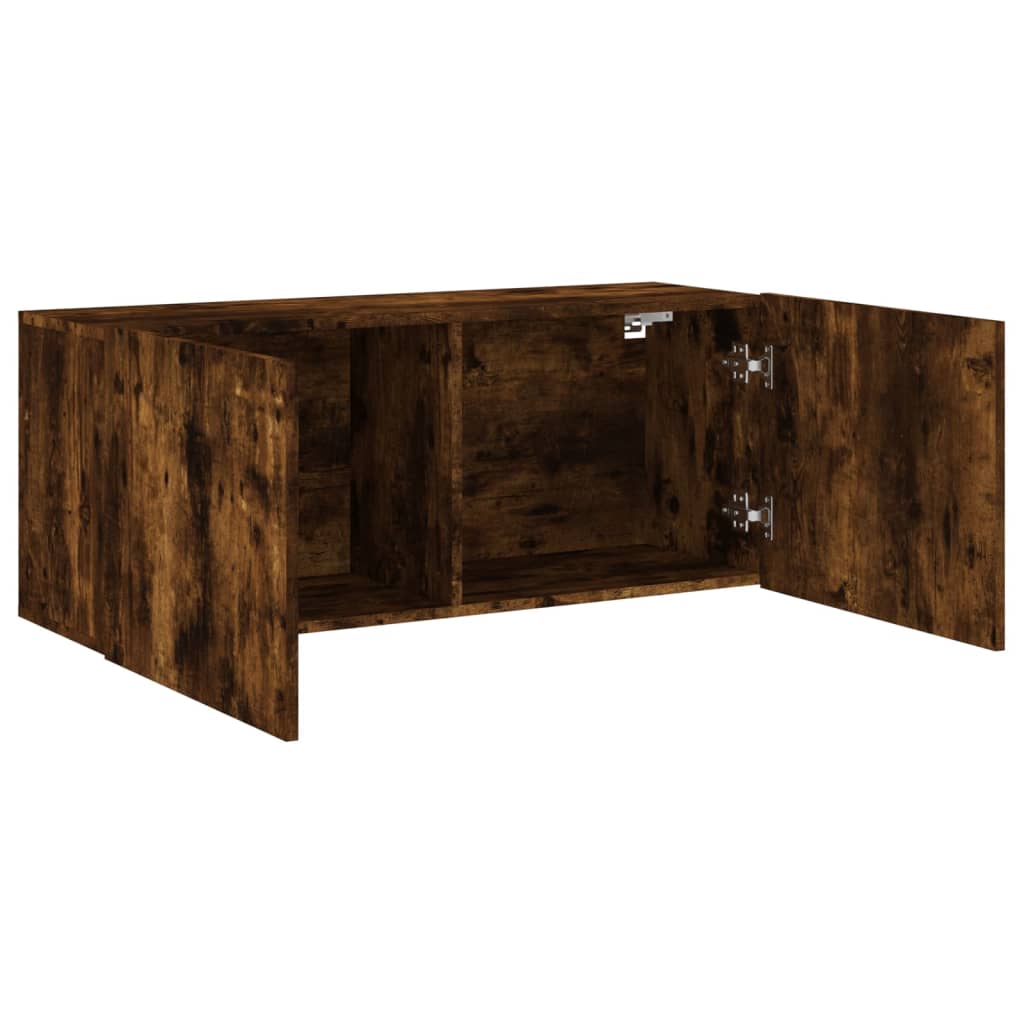 The wall-mounted TV cabinet with doors open from a side angle