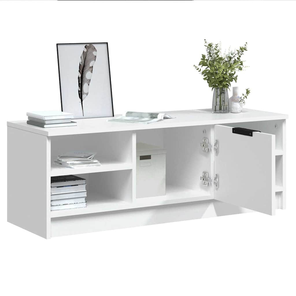 the white TV cabinet with one door open showing shelves and compartments