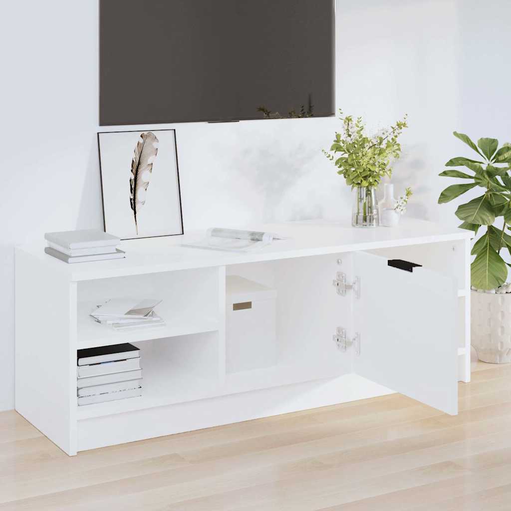 the white engineered wood TV cabinet with one door open showing storage