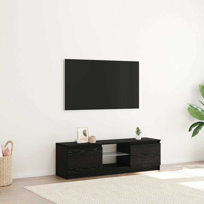 Black oak TV cabinet with LED lights in a modern living room setting with a wall-mounted TV