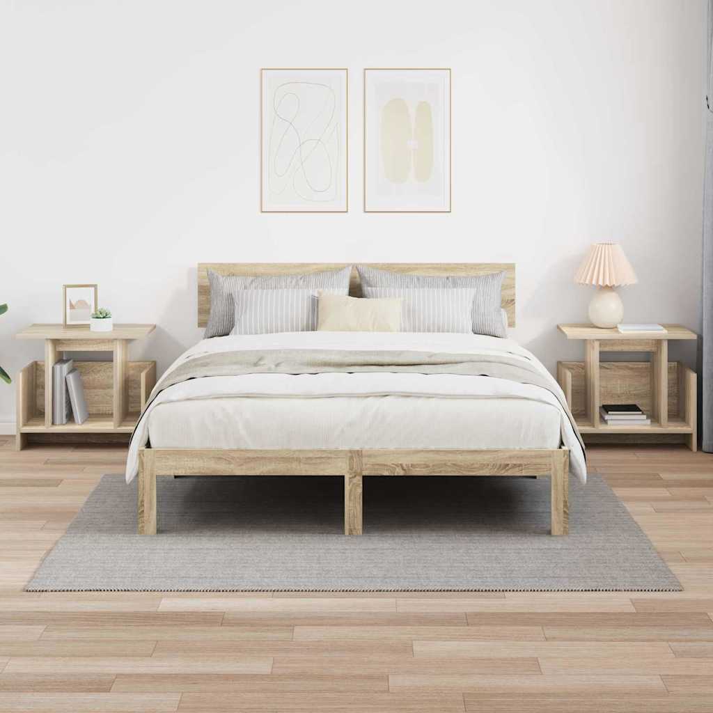 the TV stands used as bedside tables on either side of a wooden bed frame