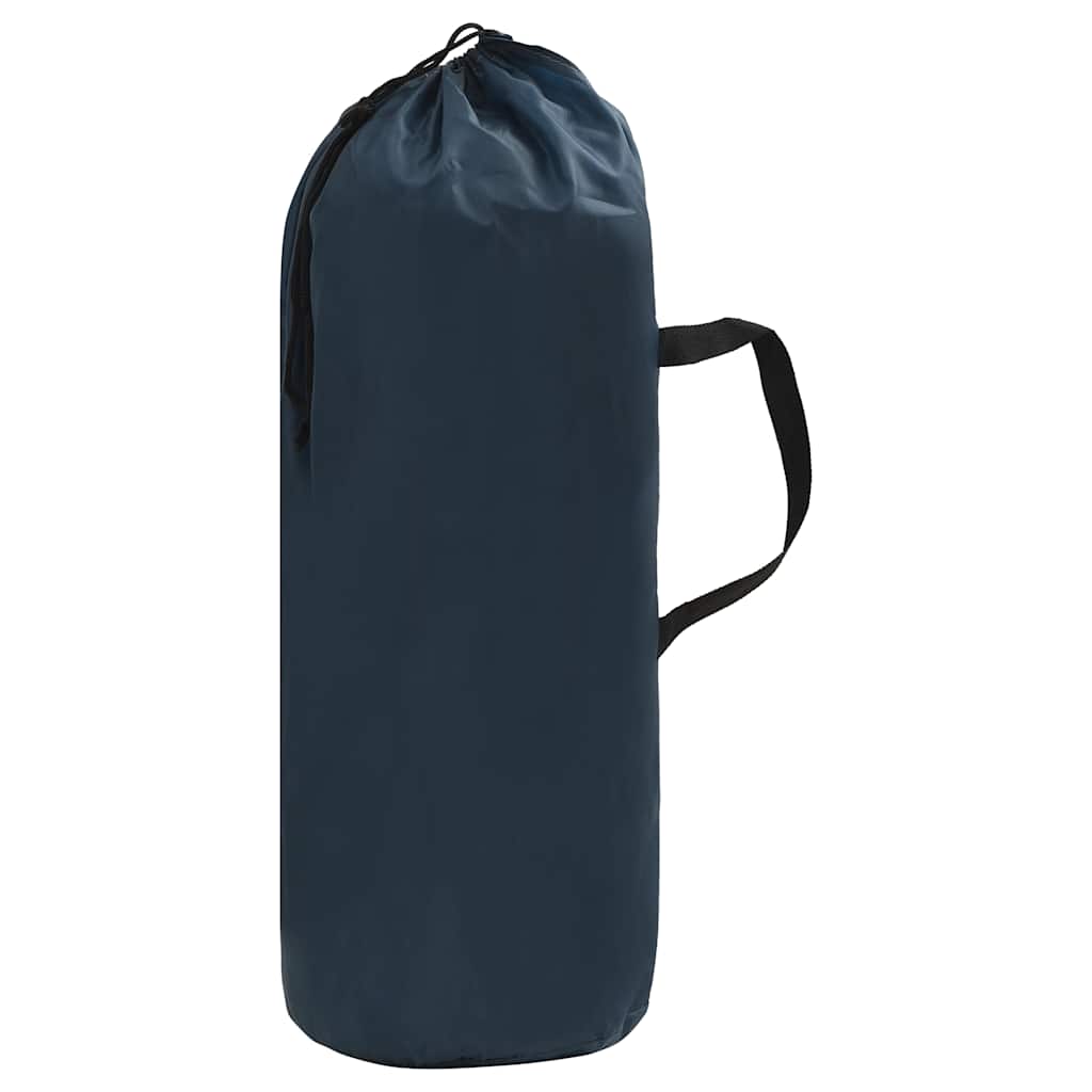 The inner tent packed away inside its dark blue cylindrical carry bag with a handle