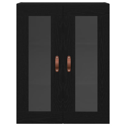 Close-up of the black oak wall cabinet with glass doors and leather handles