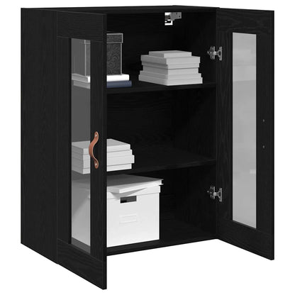 Open black oak wall cabinet with glass doors, displaying books and storage boxes