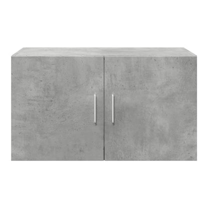 A concrete grey wall cabinet with two doors and silver handles, a close-up of the front