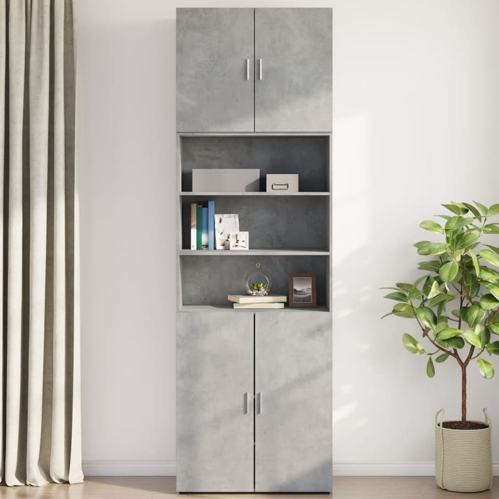 The concrete grey wall cabinet in a room setting, styled with books and a plant