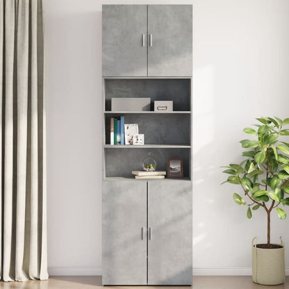 The concrete grey wall cabinet in a room setting, styled with books and a plant
