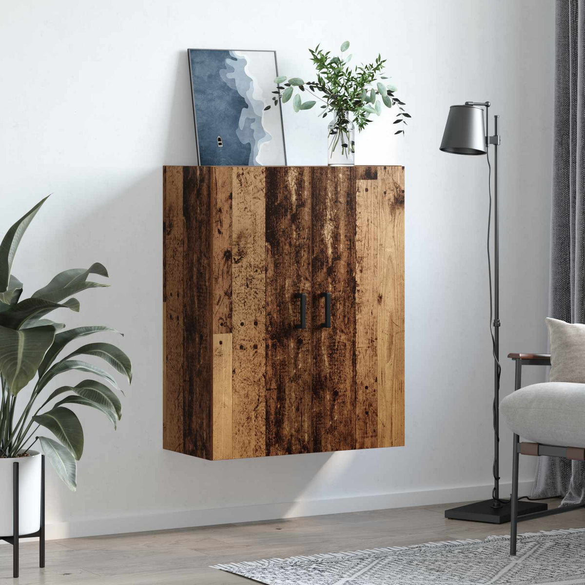 The wooden wall cabinet hanging on a wall in a stylish living room