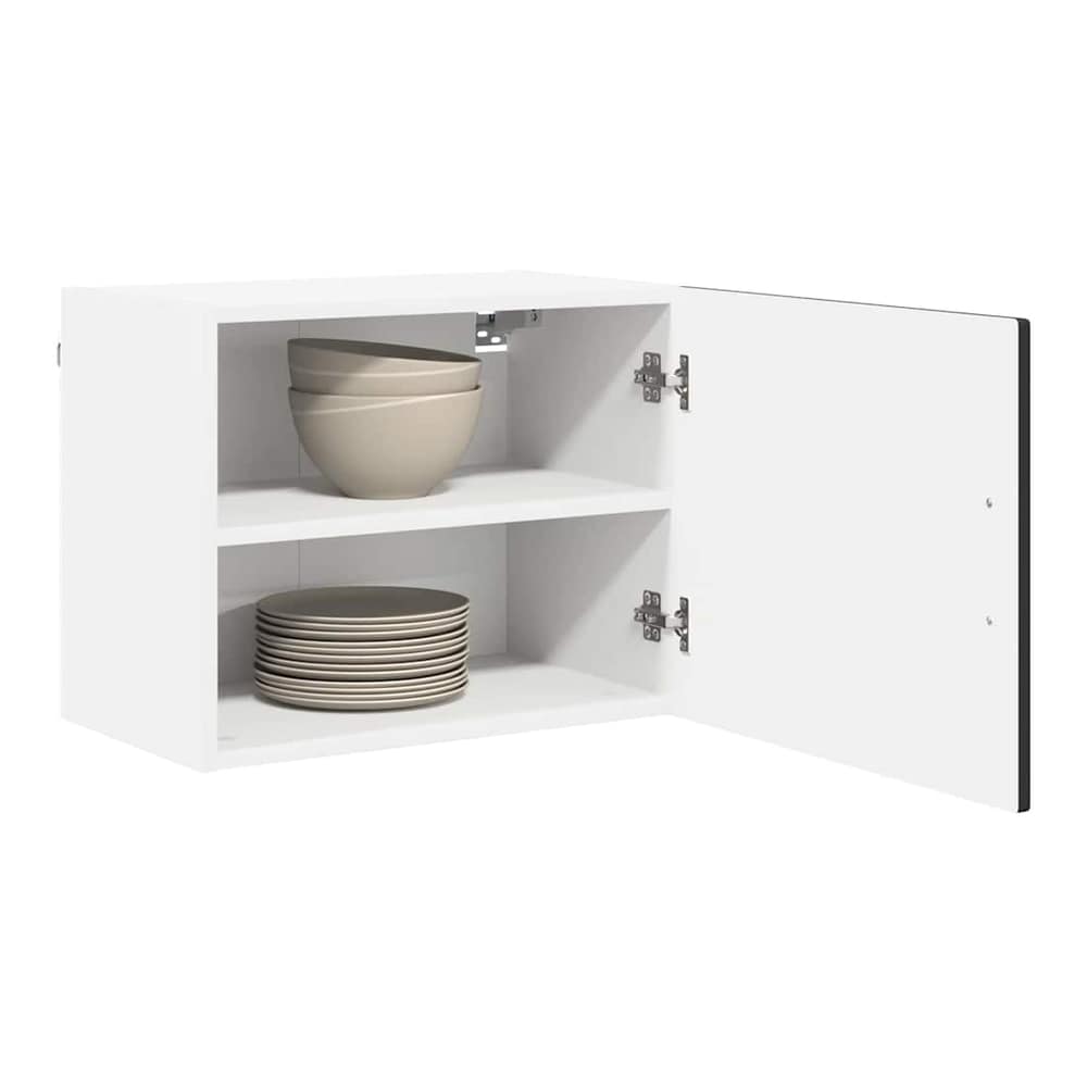 The open wall cabinet showing two shelves with plates and bowls inside