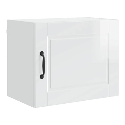 This wall cabinet has a single door with a black handle and a decorative panel