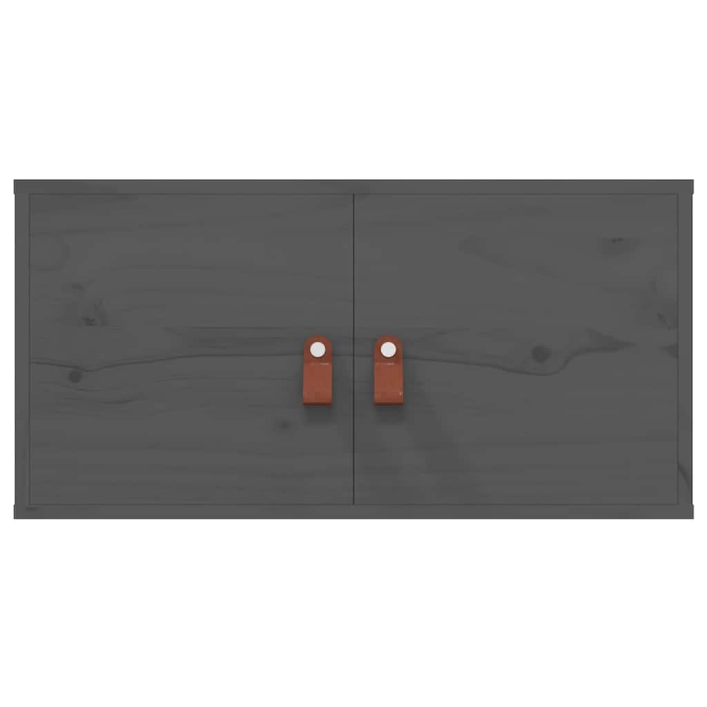 Close up of the two grey wall cabinets with brown leather handles