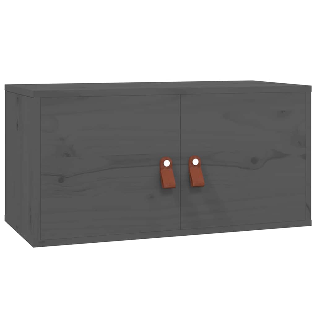 A single grey wall cabinet with brown leather handles