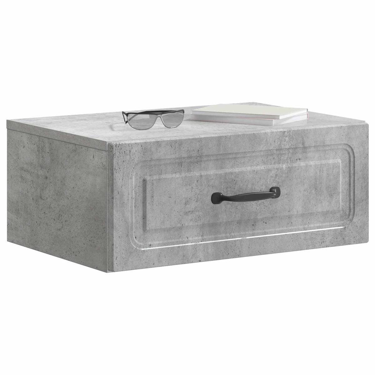 The bedside table with a pair of glasses and a book placed on the top surface