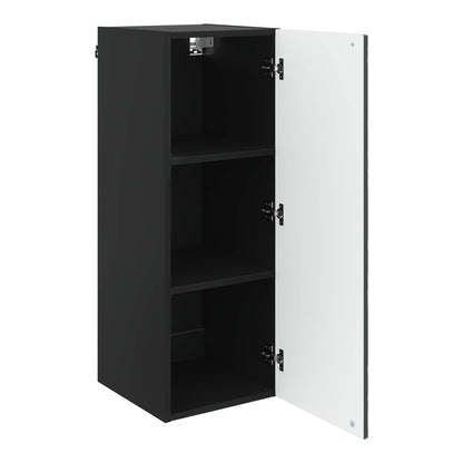 The black storage cabinet with its door open showing two shelves inside