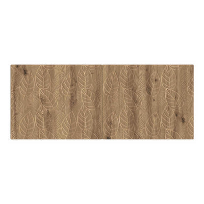 The wall-mounted headboard showing the full carved leaf design