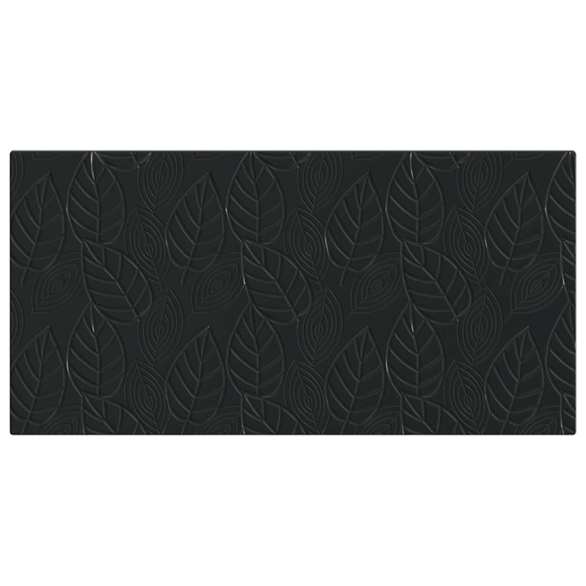 The black headboard featuring an embossed leaf design shown from the front
