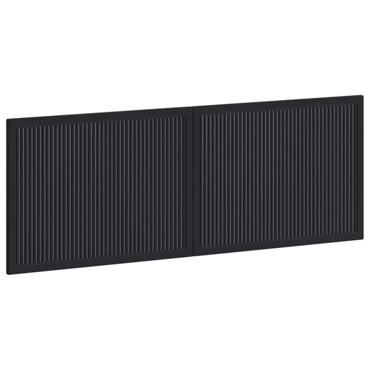 Black engineered wood wall-mounted headboard with vertical slats