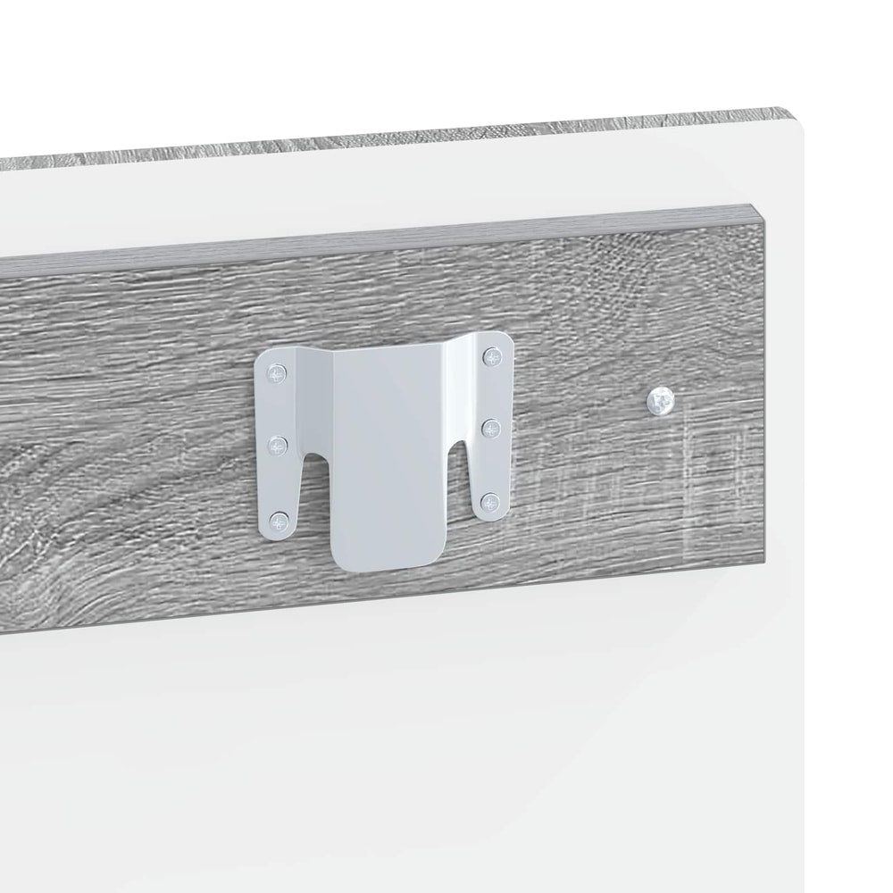 A close-up of the metal mounting bracket attached to the back of the wall-mounted headboard
