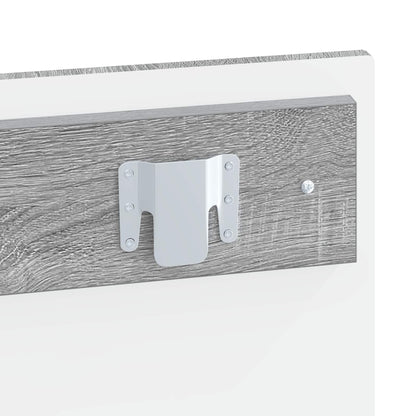 A close-up of the metal mounting bracket attached to the back of the wall-mounted headboard