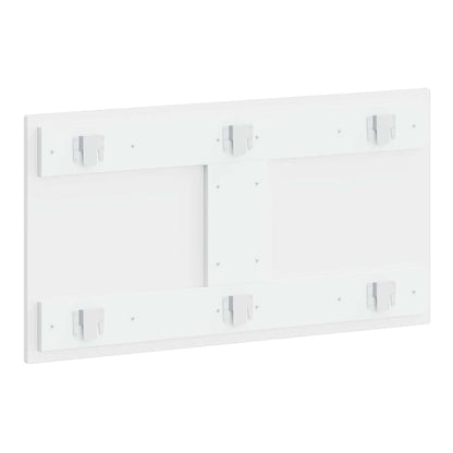 The rear side of the white headboard showing the arrangement of the wall mounting brackets