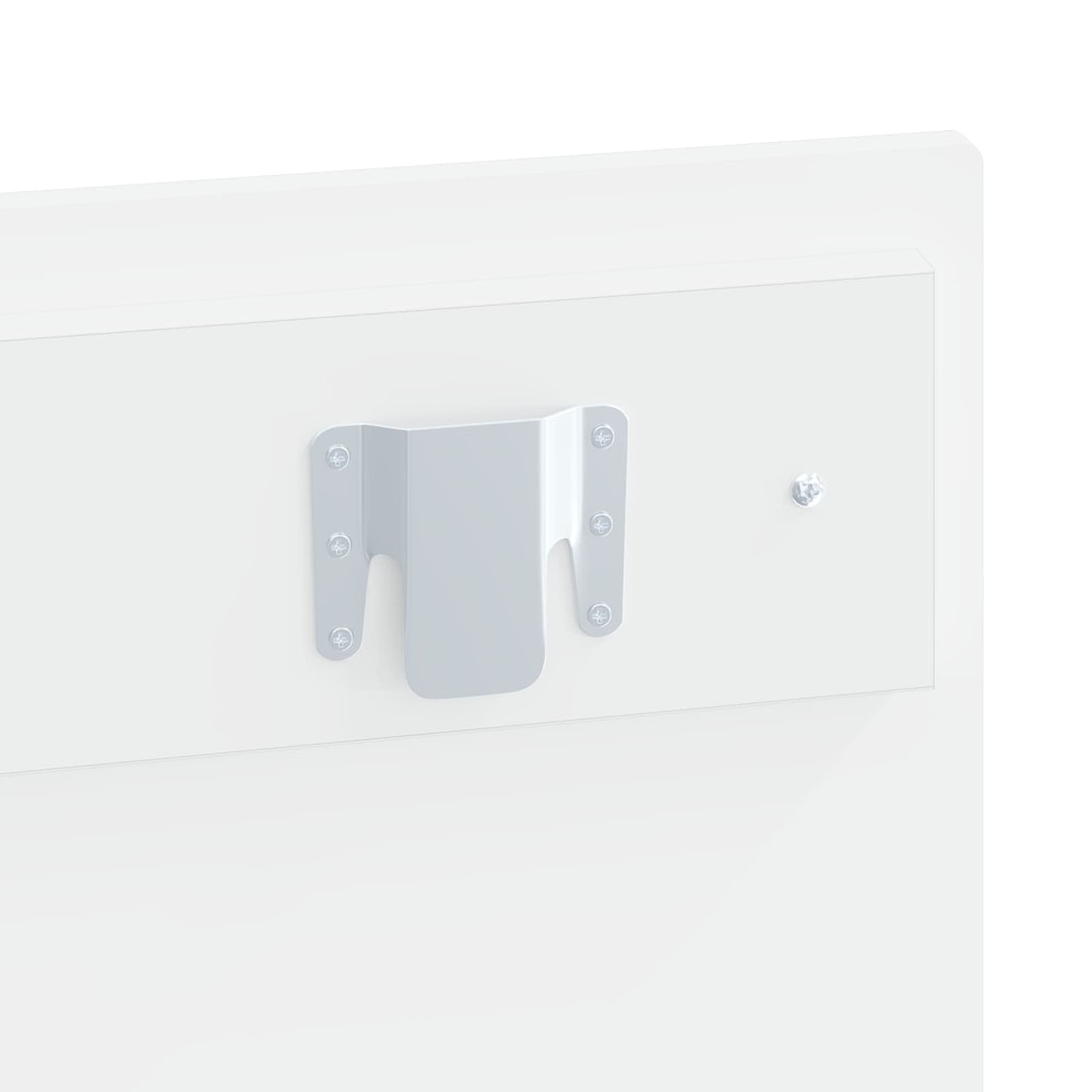 Close-up of a metal mounting bracket attached to the headboard