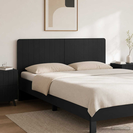 vidaXL Wall-Mounted Headboard ZWOLLE Black Engineered Wood mounted behind a bed in a bedroom