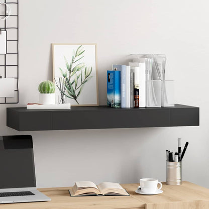 Floating Wall Shelf with Drawer Black mounted on a wall above a desk with books and decor