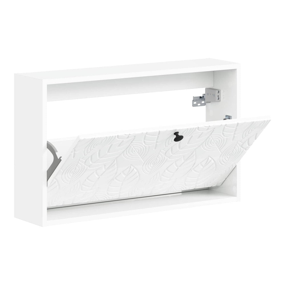The wall-mounted shoe cabinet with its door open, showing the embossed leaf pattern inside