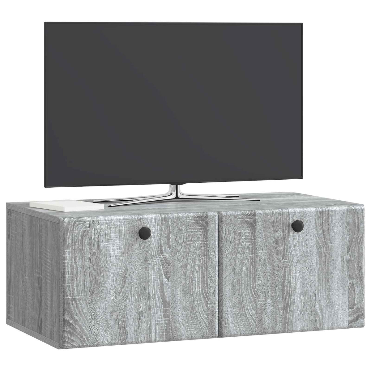 Grey Sonoma wall-mounted TV cabinet with a TV on top, against a white wall