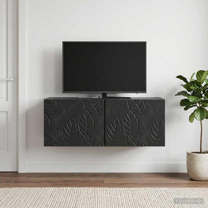 The black wall-mounted TV cabinet is shown with a television and plants