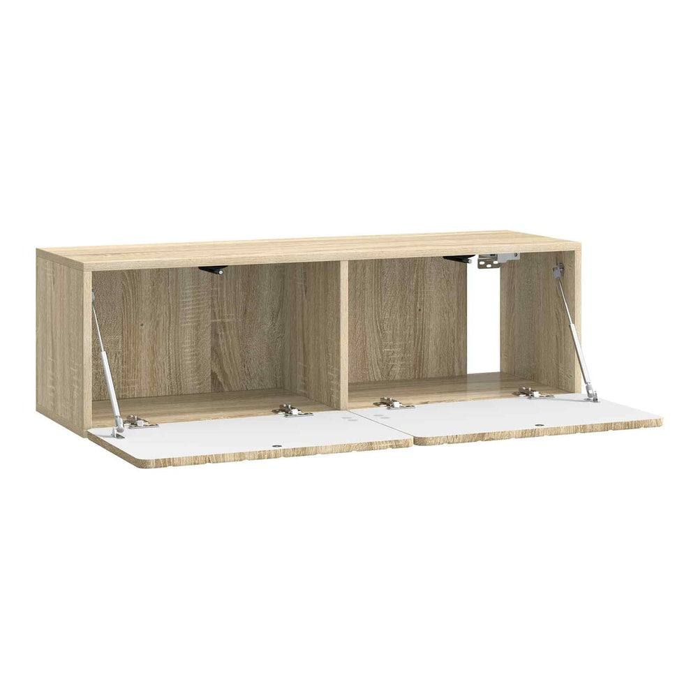 The wall-mounted TV cabinet with its two doors open, showing the internal storage compartments