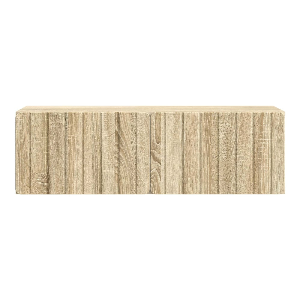 A close-up view of the front of the wall-mounted TV cabinet showing the wood grain effect